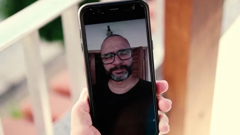 Video call between son and mother during quarentine Stock Footage 137522517