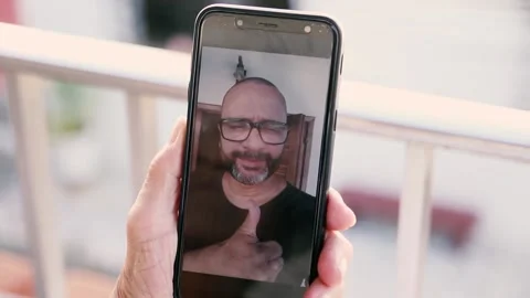 Video call between son and mother during quarentine Stock Footage 137522525