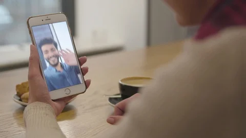 Video Call. Close Up Hand With Video Chat On Mobile Phone Screen Stock Footage