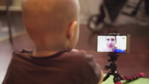 On video call communicate with small son with a father Video stock 84703141