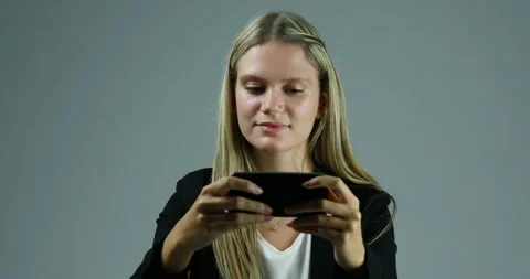 Video call disrupted, throws phone in frustration Stock Footage 267590863