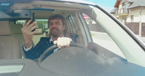 Video call. Front view of the caucasian man holding smartphone and chatting via Stock Footage 157355744