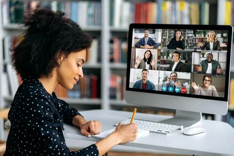 Video call, online conference using app and computer. African American female Stock Photos