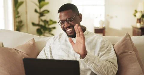 Video call, wave or black man in home with laptop, funding review or digita.. Stock Photos