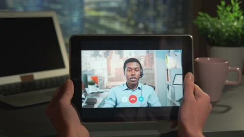 Video calling to the call center on tablet Stock Footage 157592055