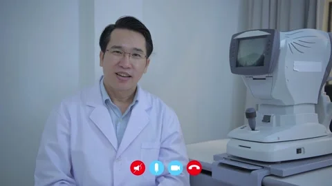 Video calling concept. Asian doctors are interviewing about eye examination.  Stock Footage 142709502