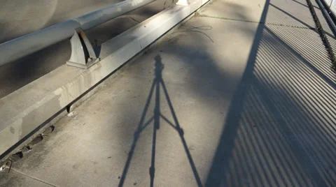 Video Camera and Tripod Shadow Stock Footage 36002669