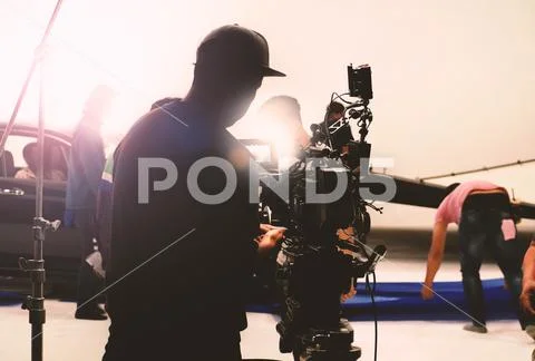 Video camera in film or movie production on tripod Stock-Fotos