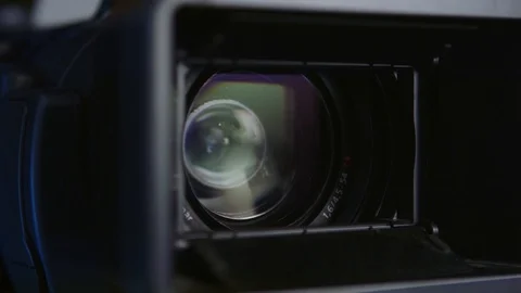 Video camera lense zooming. Close up shot Stock Footage 127612365