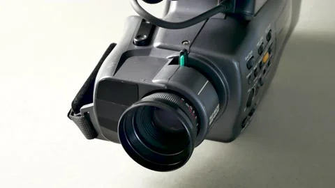 The video camera with the microphone isolated on white, in concept of technol Stock Footage 132129091