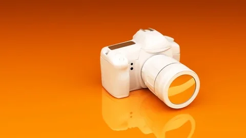 Video camera on an orange background. Stock Footage 73477593