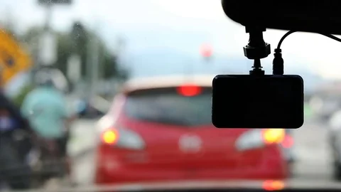 Video camera recorder in car driving traffic jam on urban road Stock Footage 81267779