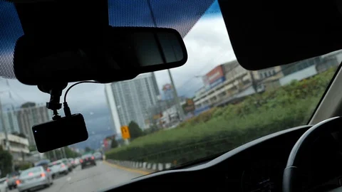 Video camera recorder in car driving Stock Footage 99107371