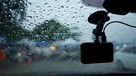 Video camera recorder inside car driving in rainy day Stock Footage 99105993