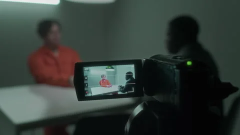 Video Camera Recording Interrogation of Dangerous Crime Suspect Video stock 276713169
