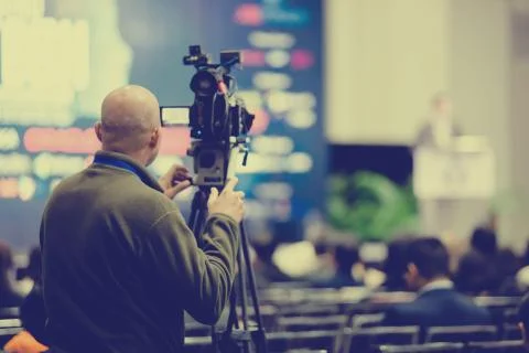 Video camera set record speaker and audience in conference hall seminar event Stock Photos