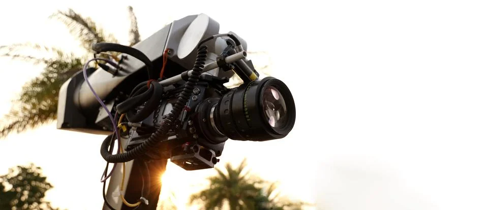 Video camera setup with professional robotic arm. BTS of Filming commercial Stock Photos