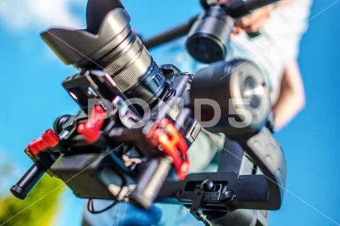 Video Camera Stabilization System. Video and Film Production DSLR Equipment. Stock Photos