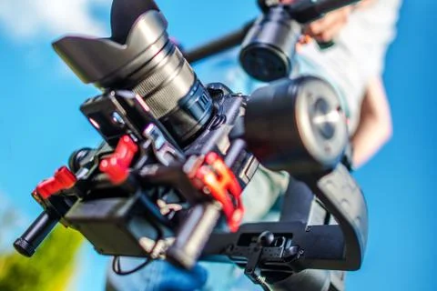 Video Camera Stabilization System. Video and Film Production DSLR Equipment. Stock Photos