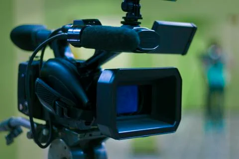 Video camera on a tripod Stock Photos