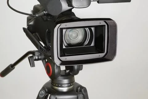 Video camera on a white background with a wide lens Stock Photos