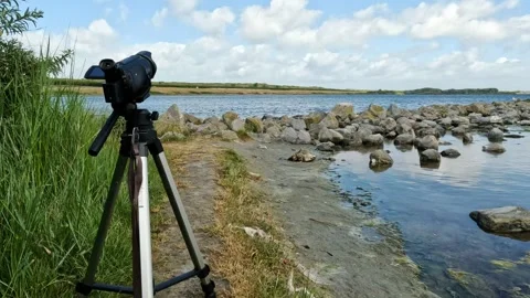 Video camera is working for time lapse of the clouds 動画素材 256198393
