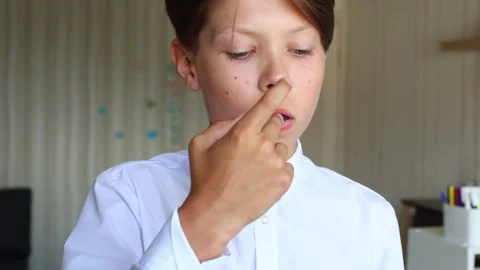 The video captures a close-up of him placing the aligner into his mouth Video stock 287455547