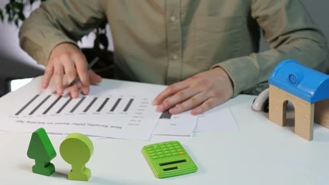 The video captures a detailed planning session where hands navigate through Stock Footage 319001186