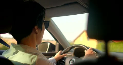 This video captures modern driving experiences through vibrant scenes Stock-Footage 314348032