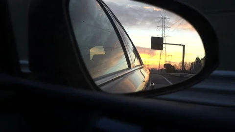 Video from the car going along a route and anchoring the sunset. Stock Footage