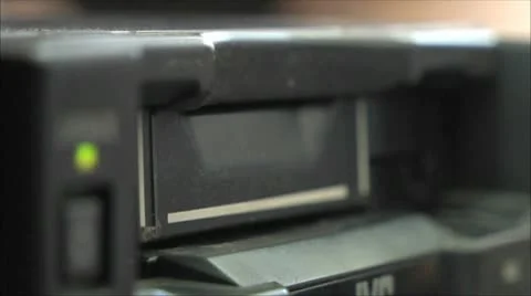 Video cassette is inserted into the VCR Video stock 9455378