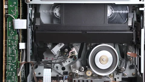 Video cassette player working, VHS insert, play, rewind, stop, eject Stock Footage 155711071