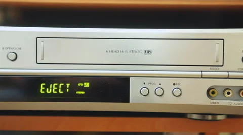 Video cassette is unloaded from a VCR, The sequence of video footage Stock Footage 49688053