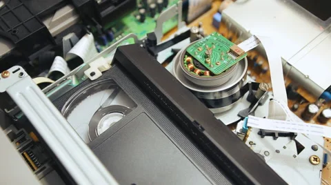 Video cassette is unloaded from a VCR, a sequence 002 Stock Footage 49688256