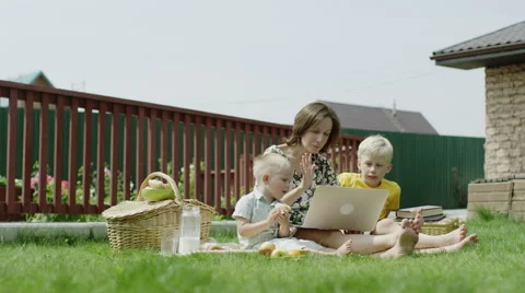Video chatting in a garden Stock Footage 66539840