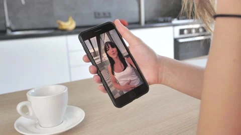 Video chatting on a smartphone device. Stock Footage 134287496