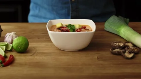 Video of chef decorating the dish with shrimp and serving Stock Footage 131589907