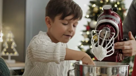 Video of children tasting sugar paste at Christmas time Stock Footage 141427693