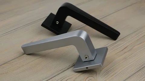 Video with circular rotation of door handles on a white  background. 360 Stock Footage 292378314