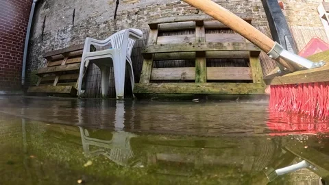 Video cleaning a deck with water and a hard broom. Видео 332802130
