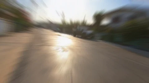 Video clip blurred action camera hyperlapse style driving ot fast on street in c Stock Footage 99850734
