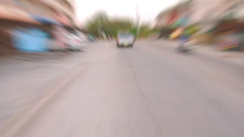 Video clip blurred action camera hyperlapse style driving ot fast on street in c Stock-Footage 99850742