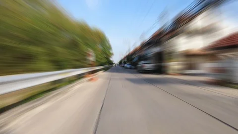 Video clip blurred action camera hyperlapse style driving ot fast on street in c Stock-Footage 99850749