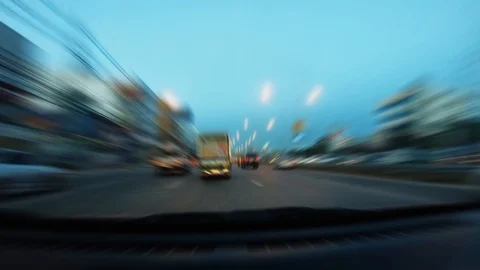 Video clip blurred action camera hyperlapse style driving ot fast on street in c Stock-Footage 99850774