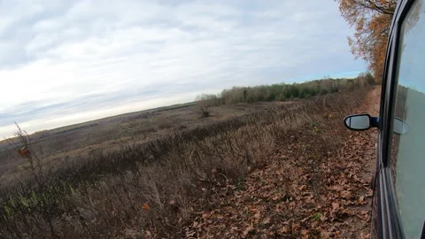 Video clip of a car driving through the countryside. Stock Footage 145121806