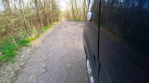 Video clip of a car driving through the countryside. Stock Footage 145122279