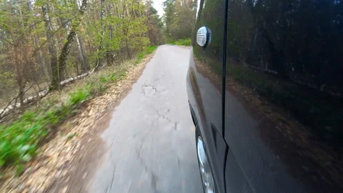 Video clip of a car driving through the countryside. Stock Footage 151563518