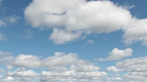 Video clip features a time lapse of beautiful soft and white clouds on a blue Stock Footage 160831666