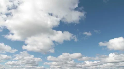Video clip features a time lapse of beautiful soft and white clouds on a blue Stock Footage 160832260