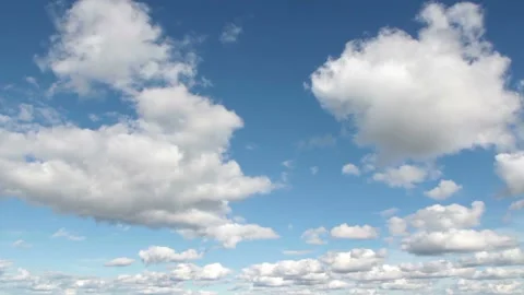 Video clip features a time lapse of beautiful soft and white clouds on a blue Stock Footage 160832623